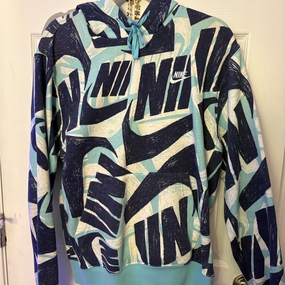blue, white, and navy blue designed cotton nike hoodie